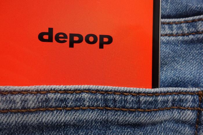 Depop logo in jean pocket